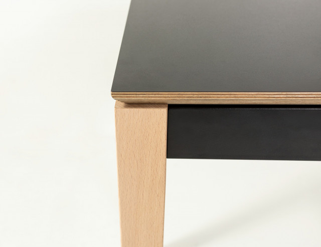Top finish made from laminate on plywood board, metal frame and beech wood legs