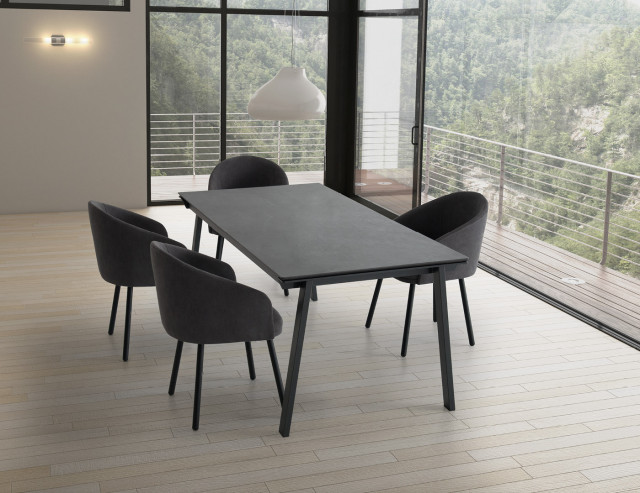 Example of Karma table installation in a dark color with chairs